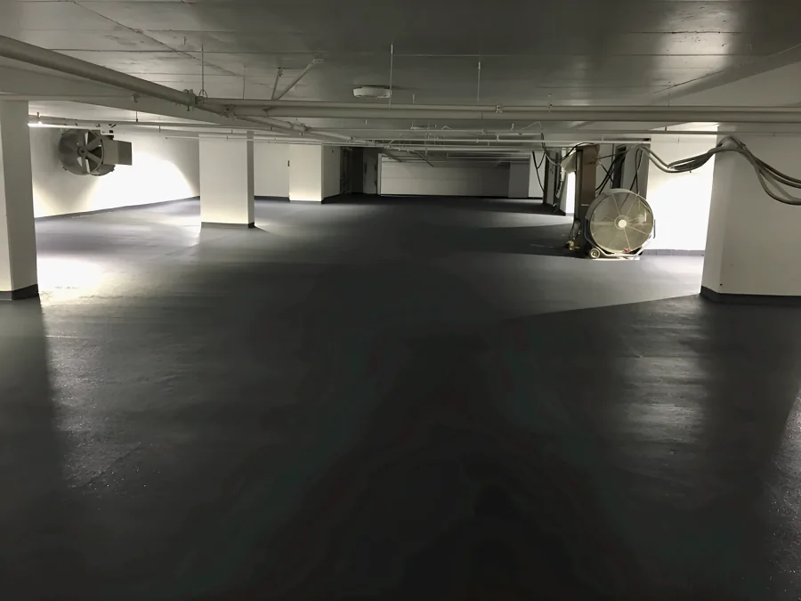 Finished dark grey Kelmar traffic coating across the 100,000 square foot underground parkade at 980 Howe Street in Downtown Vancouver