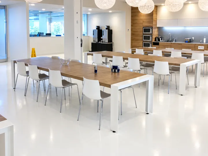 Seamless white floor in the staff cafeteria at the Aritzia head office