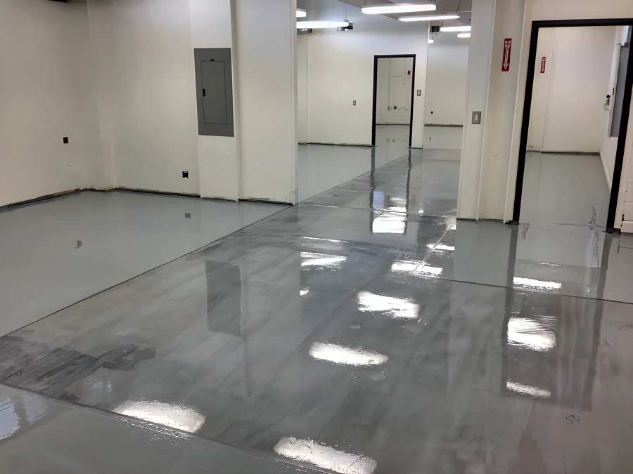 High-gloss grey ESD floor through the rooms and doorways of a BC Hydro facility