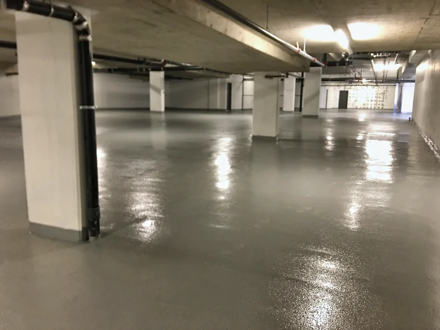 The finished Tremco Vulkem 350NF/950NF/950NF traffic coating round the columns of the Brentwood parkade