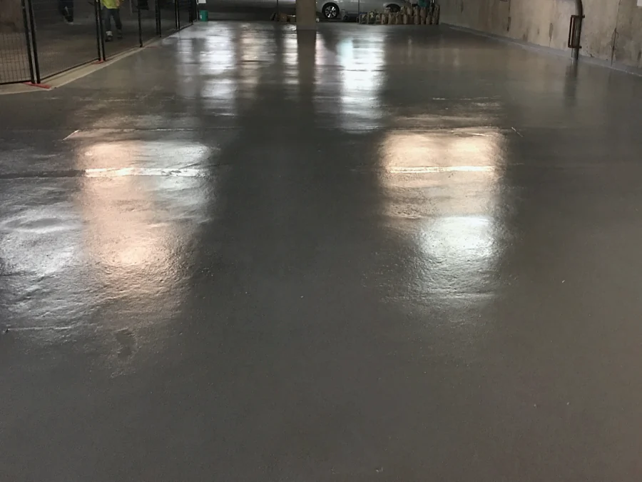 The finished Tremco Vulkem 350NF/950NF/951NF traffic coating across a parking level