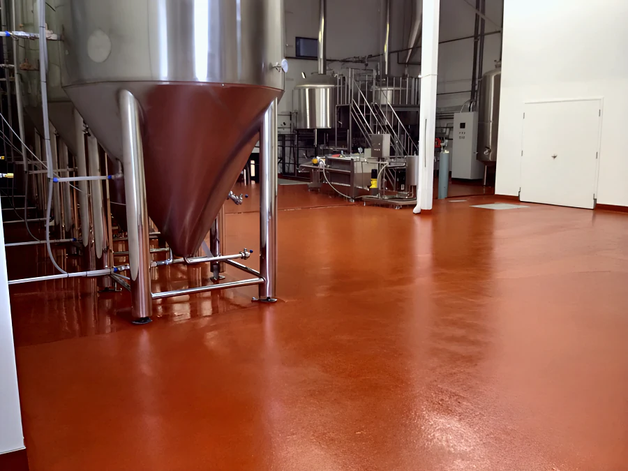 Red Eco Shop Floor running from the fermenters through to the brewhouse at Parallel 49 Brewing Company, Vancouver