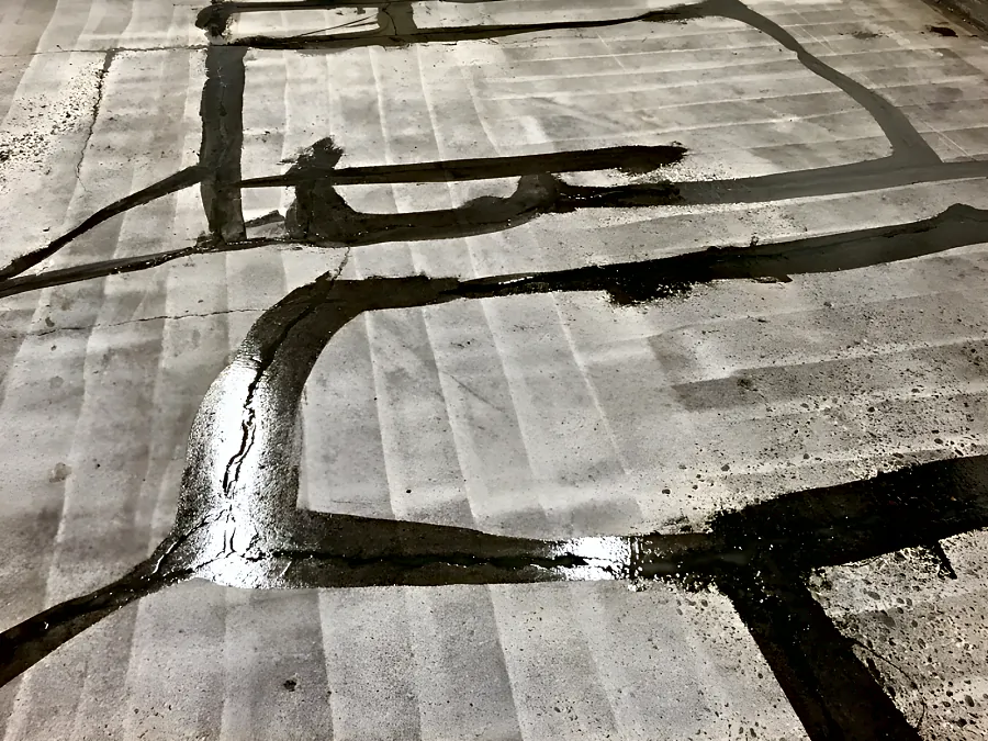 Cracks filled across the shot-blasted slab of the milk walk-in cooler at the Real Canadian Superstore in Surrey, before coating