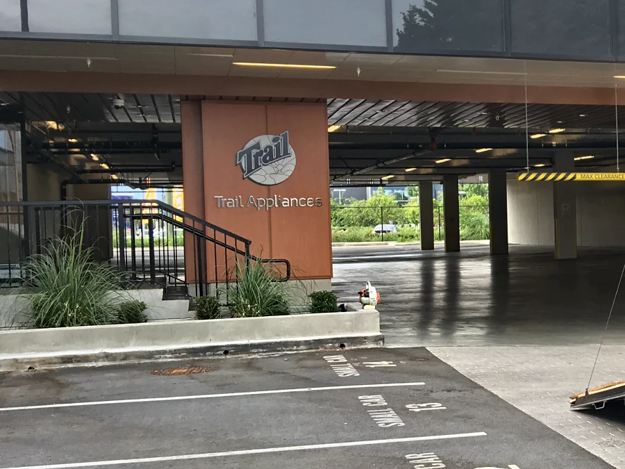 The Trail Appliances store on Sweden Way in Richmond, with the parkade under the building, 2016
