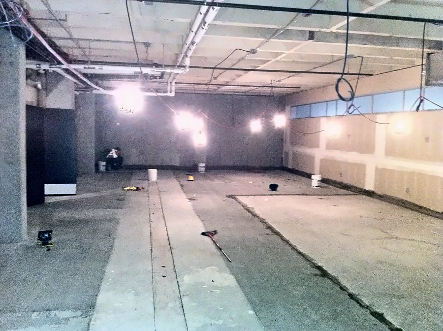 An open laboratory in the UBC Biological Sciences Building with its slab prepared before coating